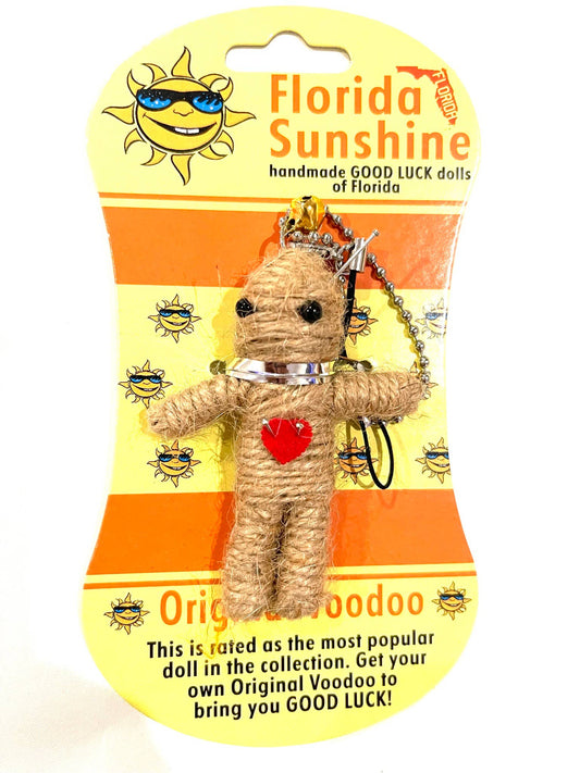 Voodoo doll with a red heart on a Florida Sunshine packaging