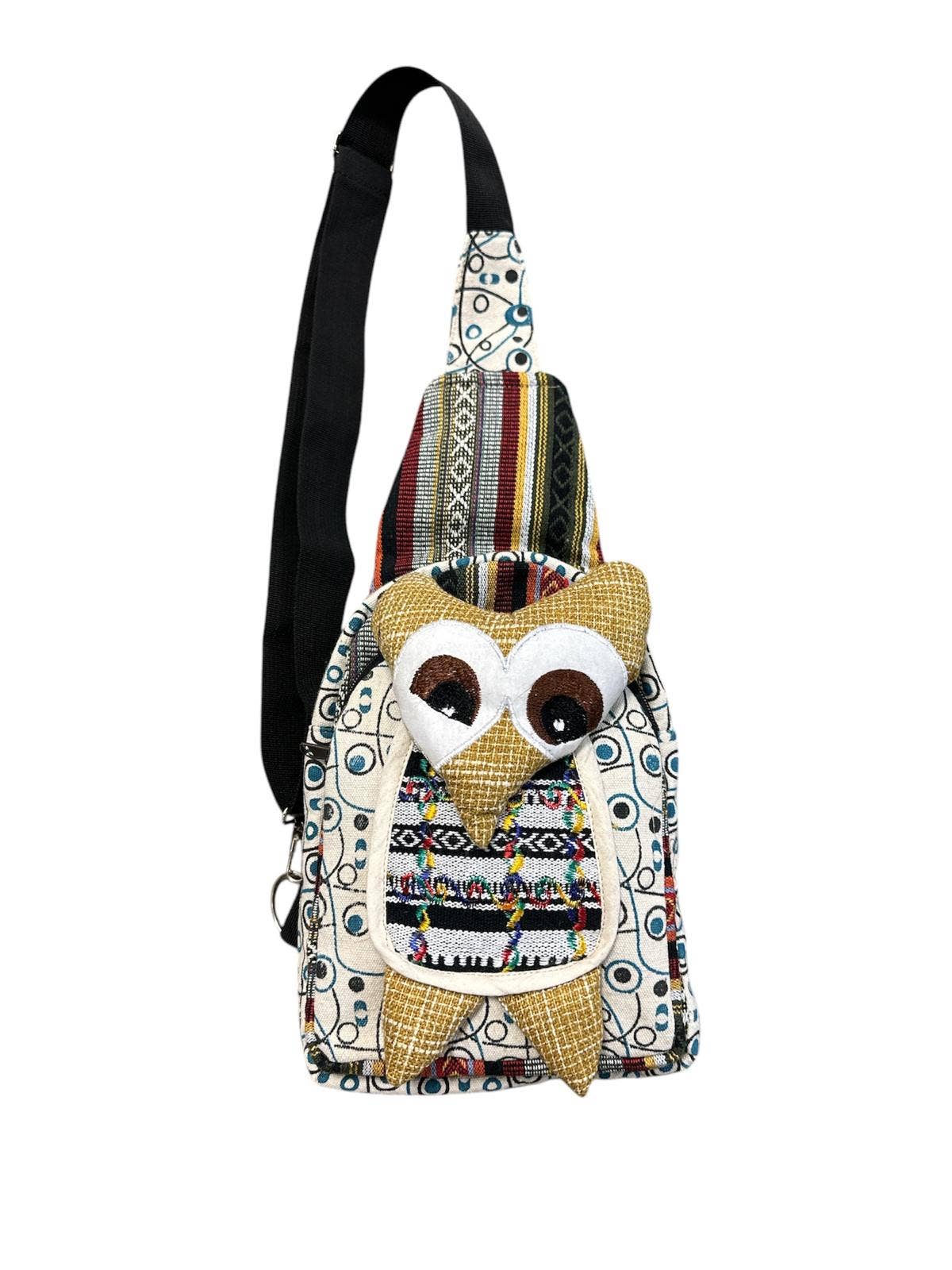 Multicolored owl-shaped bag with a patterned design on a white background