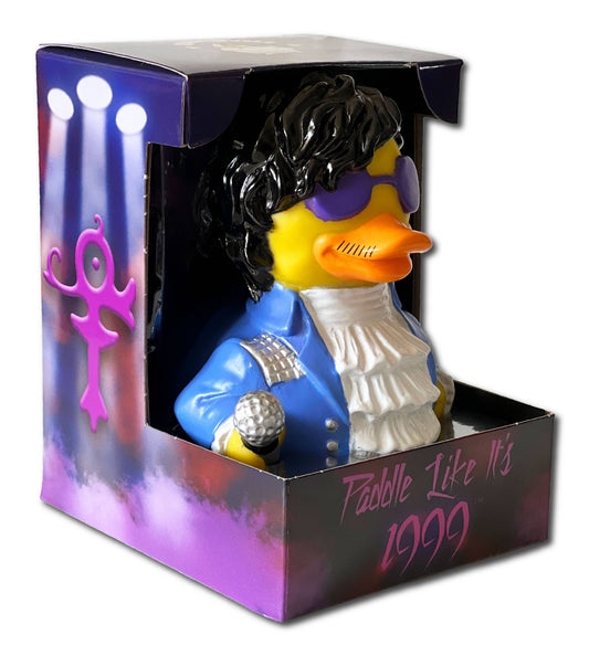 Rubber duck with rock star hairstyle in packaging with 'Paddle Like It's 1999' text.