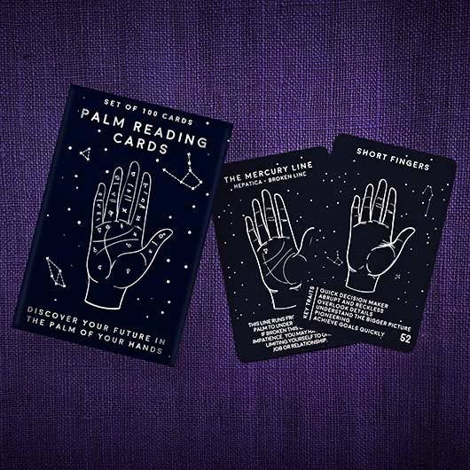 Palm reading cards on a purple textured background