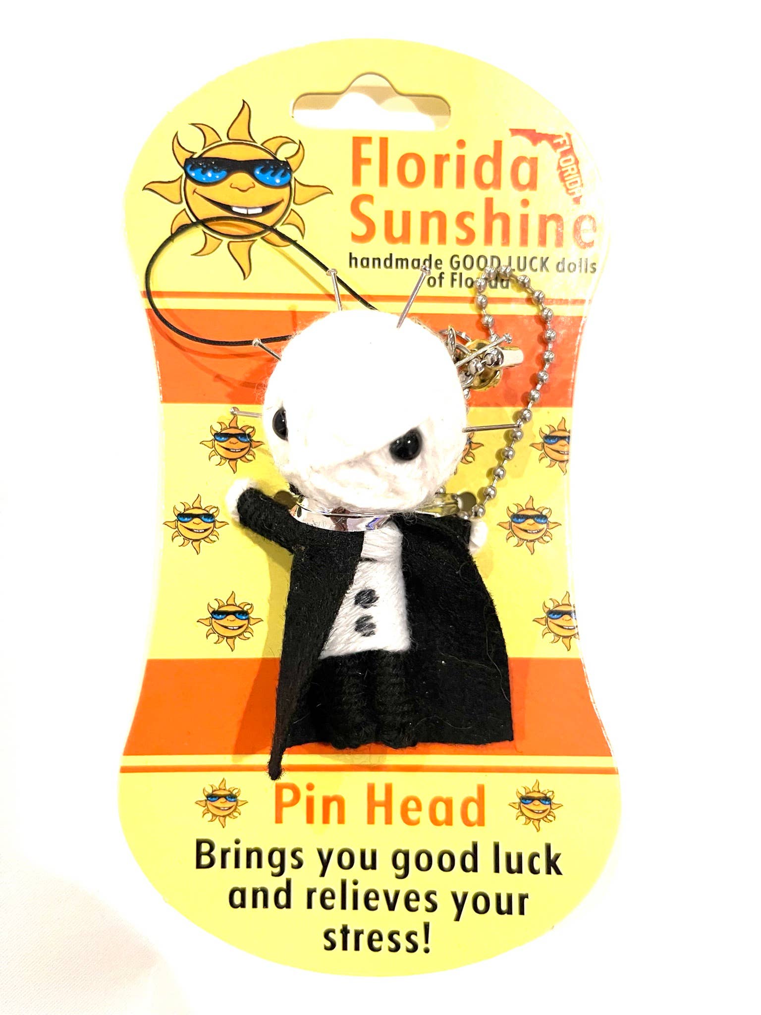 Pin Head voodoo doll keychain on a Florida Sunshine packaging with text and graphics.