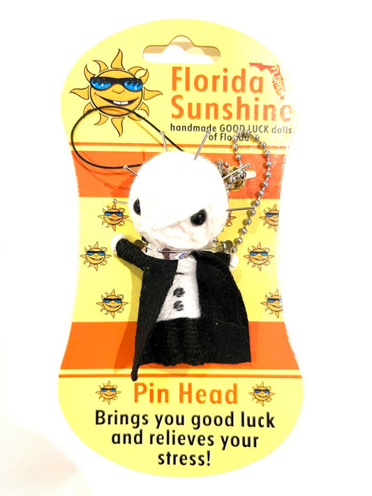 Pin Head voodoo doll keychain on a Florida Sunshine packaging with text and graphics.