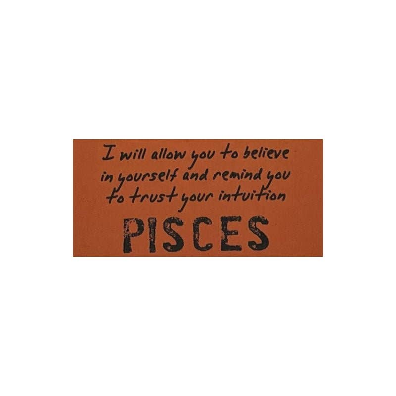 Brown card with black text and 'Pisces' printed on it