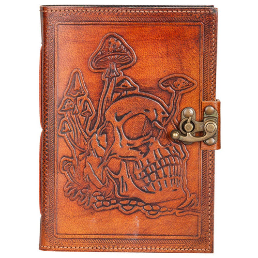 Brown leather journal with skull and mushroom design on a white background