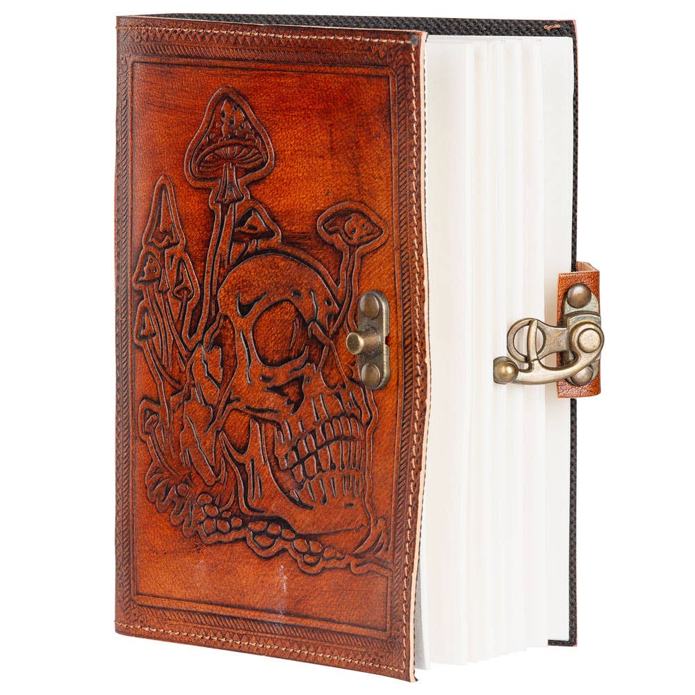 Brown leather journal with skull design and metal clasp on a white background