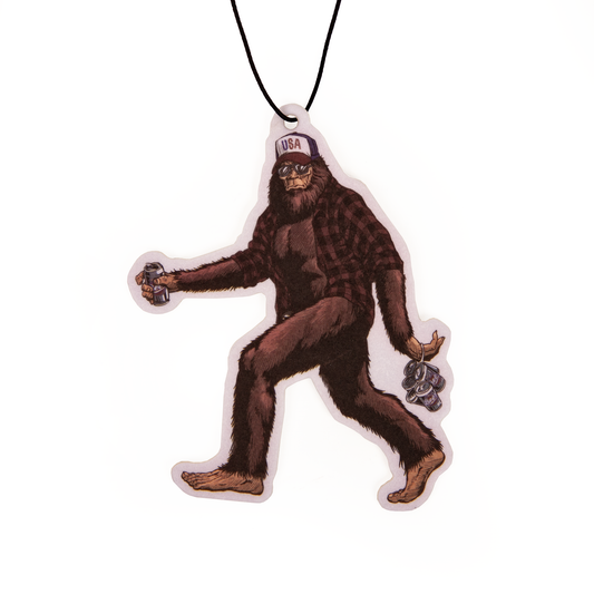Sasquatch keychain with USA cap on a white background