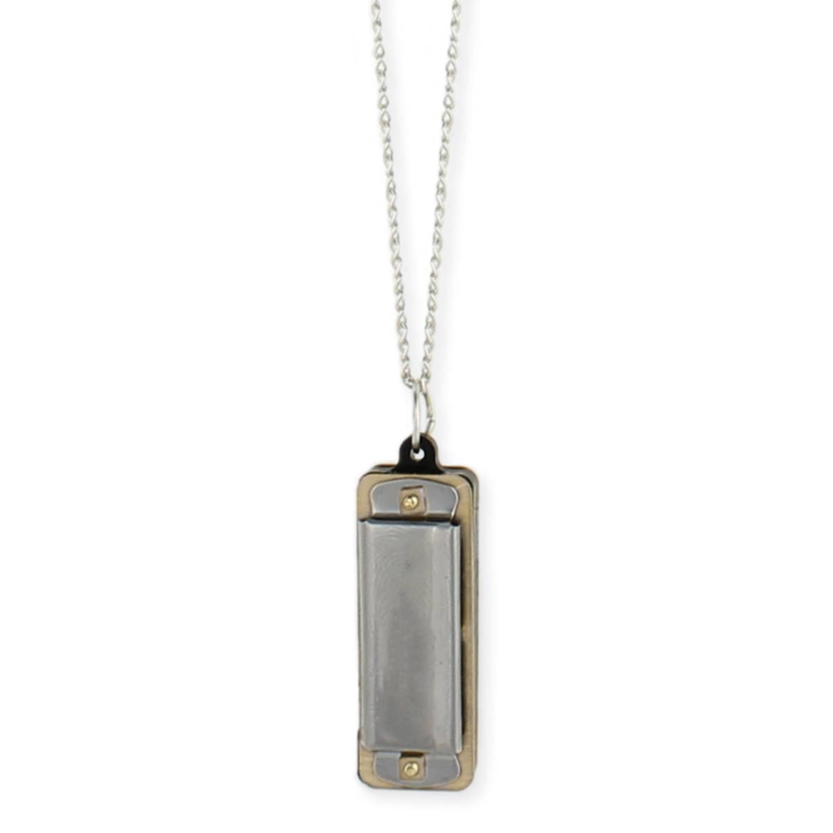 Metallic pendant on a chain against a white background