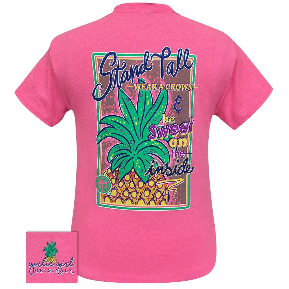 Pink t-shirt with pineapple graphic and text on a white background