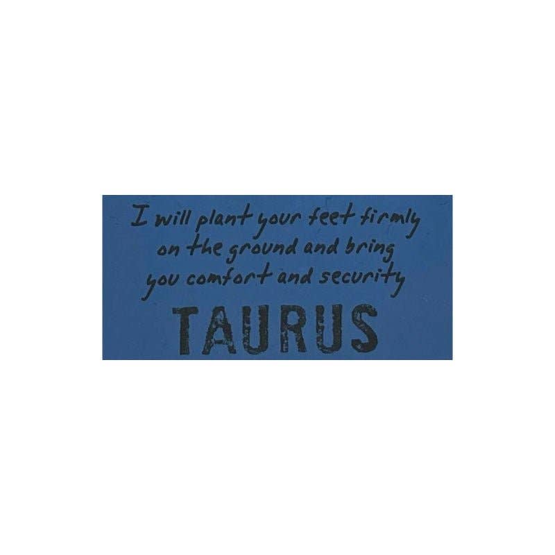 Blue rectangular patch with text 'I will plant your feet firmly on the ground and bring you comfort and security Taurus' on a white background.