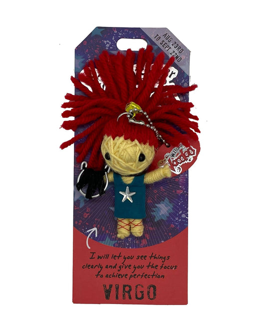 Plush voodoo doll keychain with red hair and star on a branded card, featuring the word 'Virgo'.