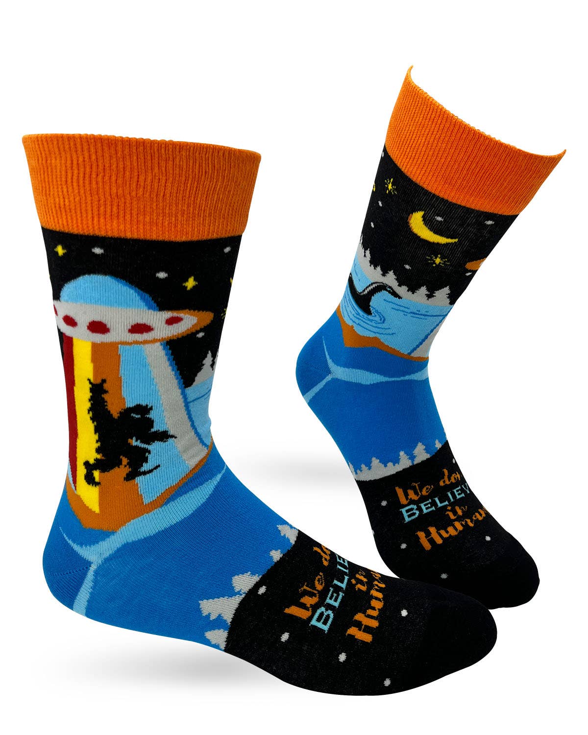 Colorful socks with a UFO and alien design on a white background