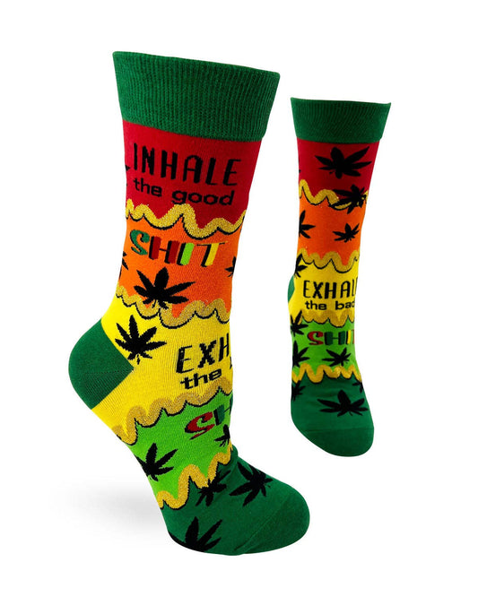 Colorful socks with text and leaf designs on a white background