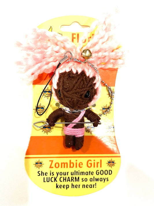 Zombie girl charm with pink bow on a yellow and orange packaging