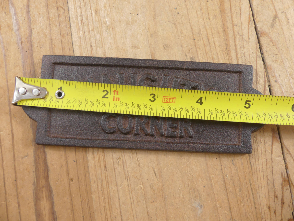 CAST IRON "NAUGHTY CORNER" SIGN