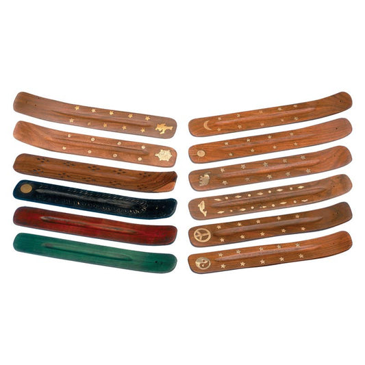 Set of wooden incense sticks with engraved designs on a white background
